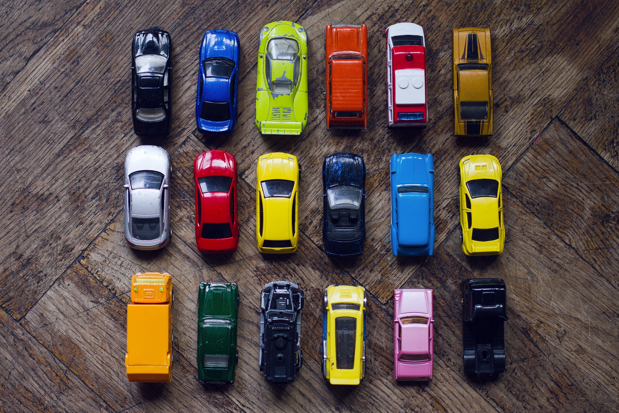 assorted colorful car collection on floor