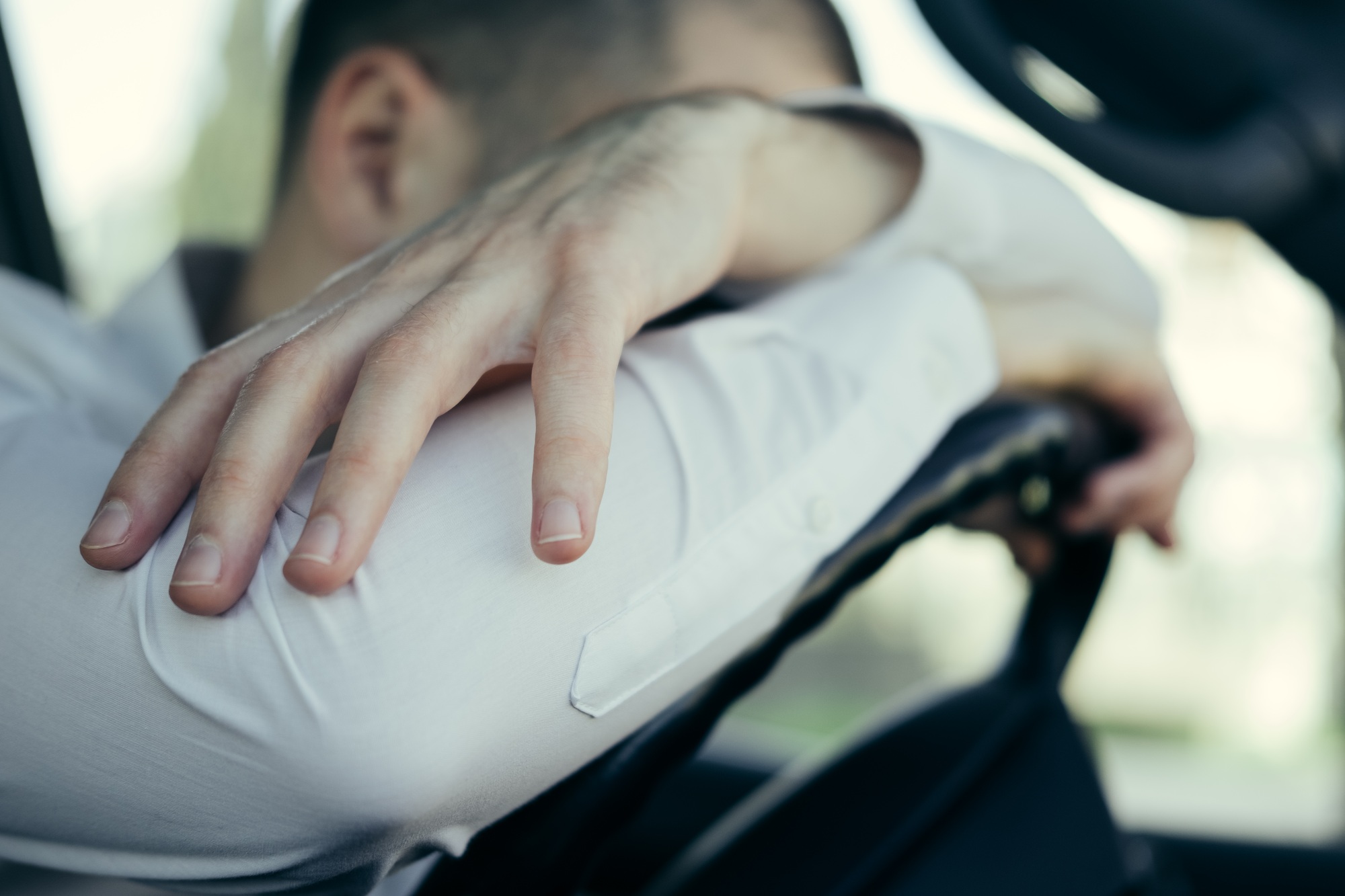 Stressed and furious driver in his car